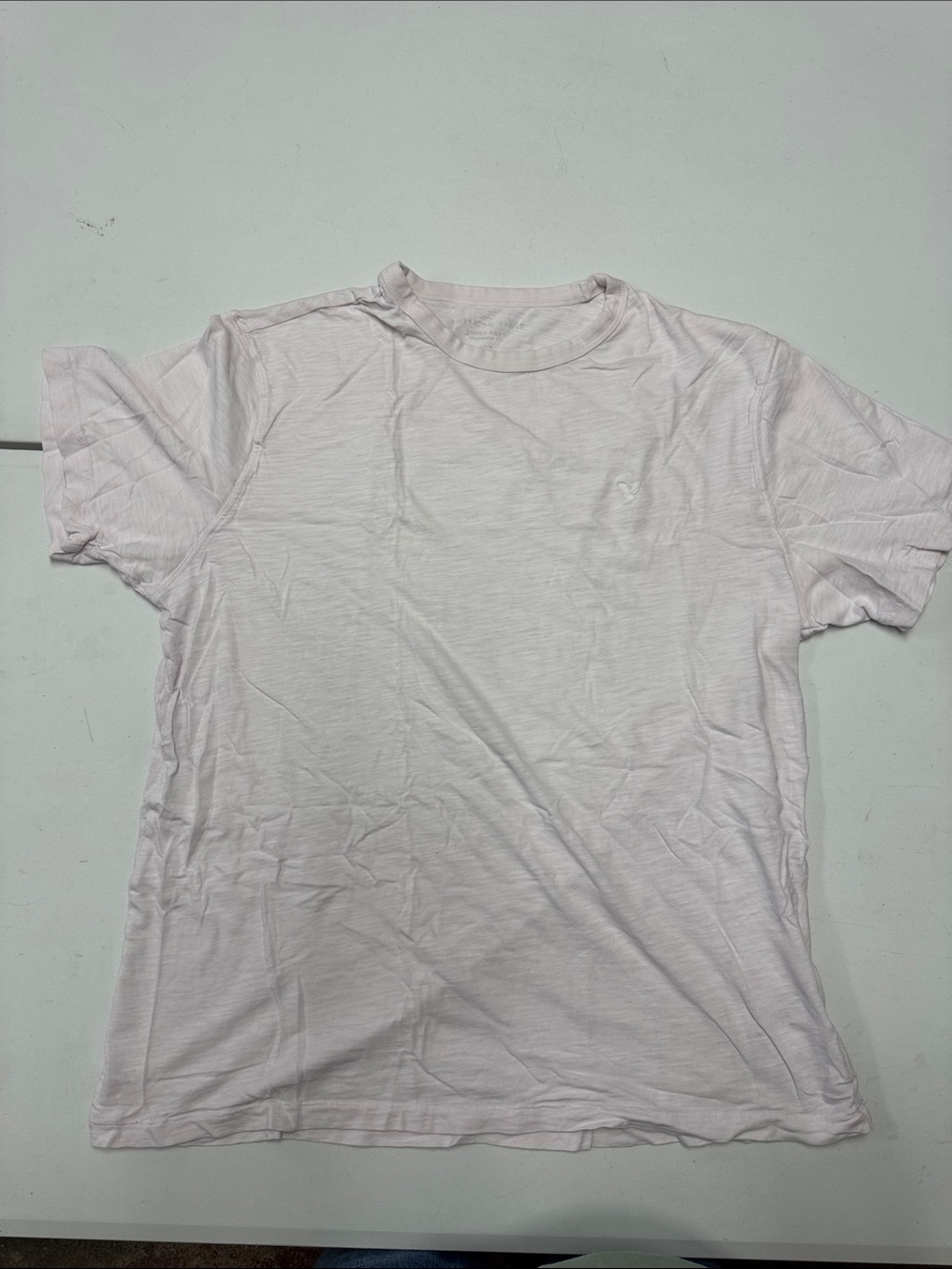 American Eagle Outfitters Men's Short Sleeve Crew Tee in Pale Pink
